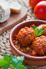 Albondigas - Spanish cuisine traditional homemade meatballs in rich tomato sauce.