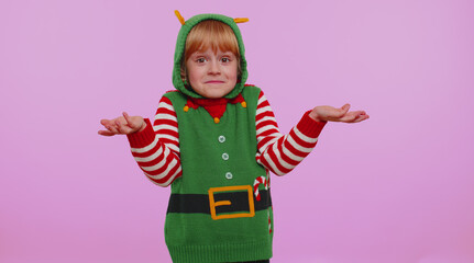 I dont know what to say. Confused one girl in Christmas Santa helper Elf costume feeling...