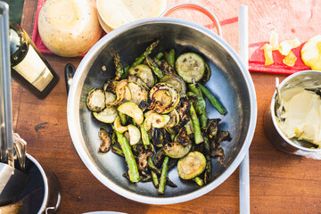 Delicious grilled cucumber and asparagus on bowl