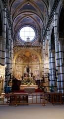 Beautiful architecture and interior of art in Siena Duomo . One of the most important examples of gothic architecture in Siena , Italy