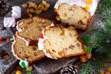 Traditional Christmas cake on wooden table