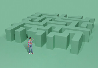 Shot of a boy looking at the 3D green maze and making a choice or decision, rear view. Education...