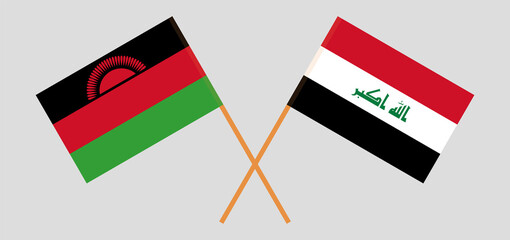 Crossed flags of Malawi and Iraq. Official colors. Correct proportion