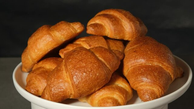 French crispy croissants rotate and close-up