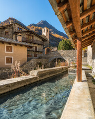 The picturesque village of Chianale during fall season, in the Varaita Valley, Piedmont, northern...