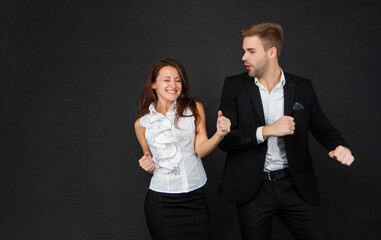 formal couple having fun. businessman and businesswoman.
