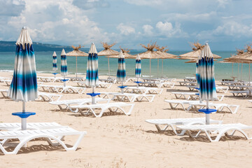 lounge chairs on the beach
