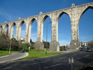 Lisbon. Arches of old aqueduct "Aguas Livres" crossing Alcantara valley. Winter 2nd January 2015
