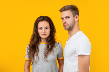 Fototapeta premium relationship of girl and guy on yellow background, love
