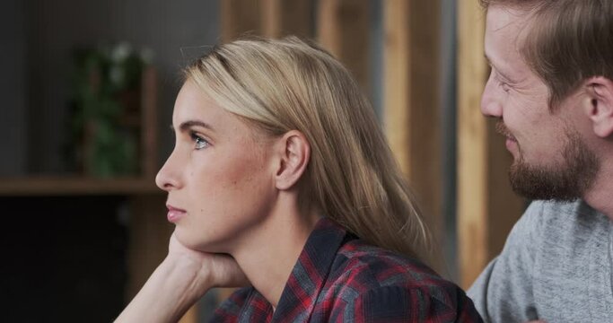 Caring guy embracing frustrated female suffering fired business problem at work financial crisis or relationship trouble. Guilty man cuddle woman trying regret support and consoling asking not divorce