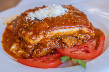 Moussaka dish on a plate served in restaurant on Corfu Island, Greece