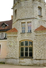 Historic building with a tower in the Old Town, in Tallinn, Estonia
