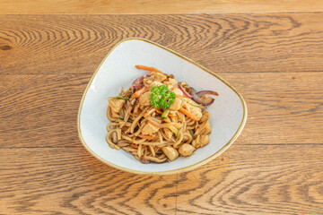 Sauteed noodles with vegetables, onions and chicken and with Thai sauce - obrazy, fototapety, plakaty