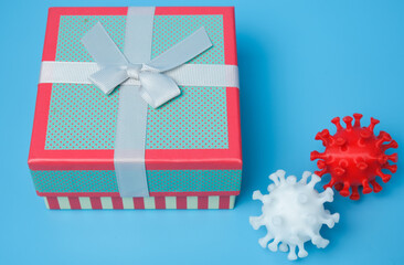 A picture of giftbox with coronavirus in 3D printed insight. Becareful when receive gift during this Covid-19 pandemic.