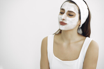 Woman standing in a cosmetology studio