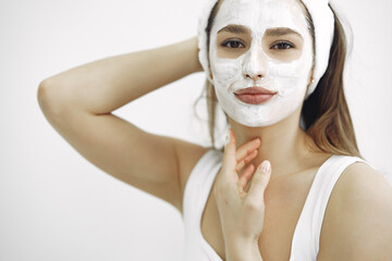 Woman standing in a cosmetology studio