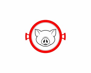 Pig head in the grill pan logo