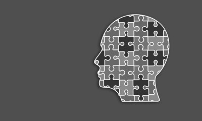 Male Head silhouette composed with pieces of Jigsaw game parts in black and white style. Human head monochrome puzzles. thinking, psychology, Creative and Brainstorming man brain concept 