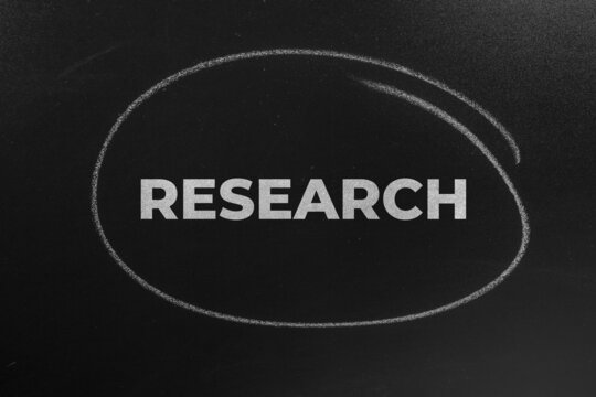The Word Resarch Written On The Chalkboard. Resarch concept background.
