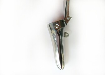 Gynecologic speculum on a white background. Cusco's vaginal Speculum for examination of vagina. medical, surgical instruments. 