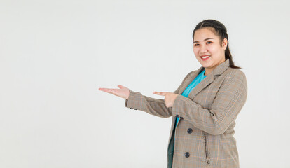 Lively Asian woman confidently pointing fingers to mark exactly correct direction and remarkable guide recommended to fire target