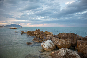 Fototapeta na wymiar Sunset on the beach. Loreto, Italy