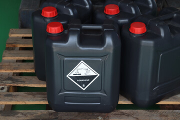 Corrosive chemical symbols on a chemical tank