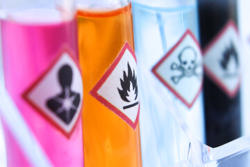 Chemicals in test tubes and symbols used in laboratory