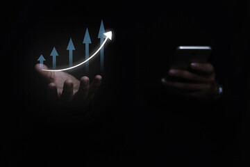 Business man holding tablet and showing holographic graphs and stock market statistics gain profits. Concept of growth planning and business strategy.