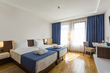 Interior of a double bed bedroom in modern hotel