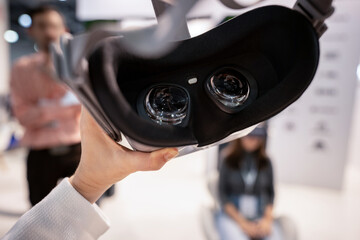Virtual reality glasses in hand. Inside view