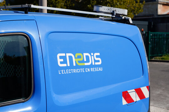 ENEDIS edf logo brand and text sign on blue panel van truck of french electricity provider distribution company