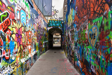 Graffiti-covered wall in Ghent, Belgium
