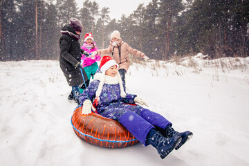 children playing outside snow winter laughter happy holiday holiday new year christmas