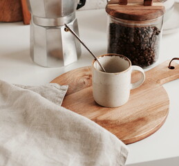 Coffee mug mockup on the gray table in the modern kitchen interior . copy space.Business food brand template.