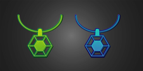Green and blue Pendant on necklace icon isolated on black background. Vector
