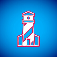 White Lighthouse icon isolated on blue background. Vector