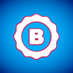 White Bottle cap with inscription beer icon isolated on blue background. Vector