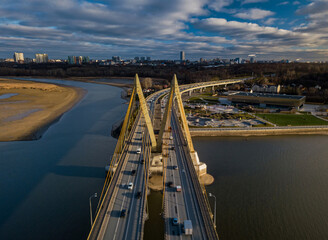 Obraz premium A top view of the Millennium Bridge in Kazan . Cable-stayed bridge across the river. Autumn day. 