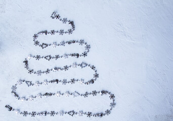 Creative Christmas tree. idea. Christmas fir tree with decoration on a board. Copy space. Selective focus