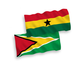 National vector fabric wave flags of Co-operative Republic of Guyana and Ghana isolated on white background. 1 to 2 proportion.