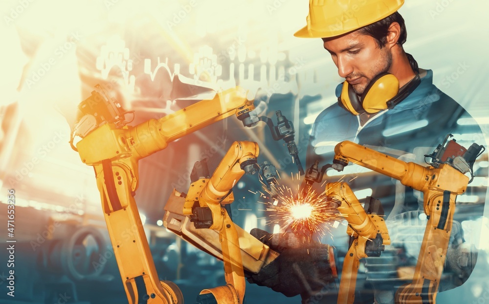 Poster mechanized industry robot arm and factory worker double exposure . concept of robotics technology fo