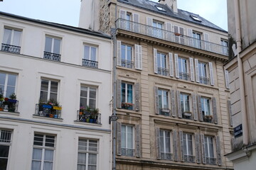 The facades of some nice Parisian buildings in the quarter "le Marais".