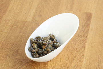 Salted marinated capers snack appetiser