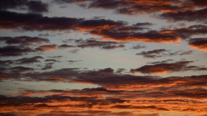 Orange sunrise clouds above Reykjavík, Iceland.