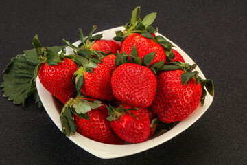 Ripe sweet strawberry with leaf