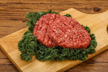 Raw beef burger cutlet for cooking