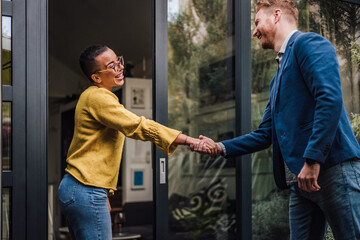 Shaking hands handshake greeting good old friend, client, job professional or new employee, two...