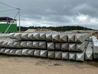 stack of concrete blocks, construction site against a blue sky