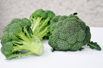 Ripe and fresh broccoli close-up.
Healthy green organic raw broccoli buds, ready to cook. Green diet.
Selective focus.